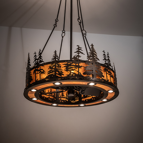 Tall Pines Chandel-Air illuminating rustic space with warm amber light.