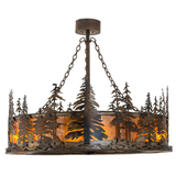 Side lit view highlighting pine tree design and amber mica illumination.