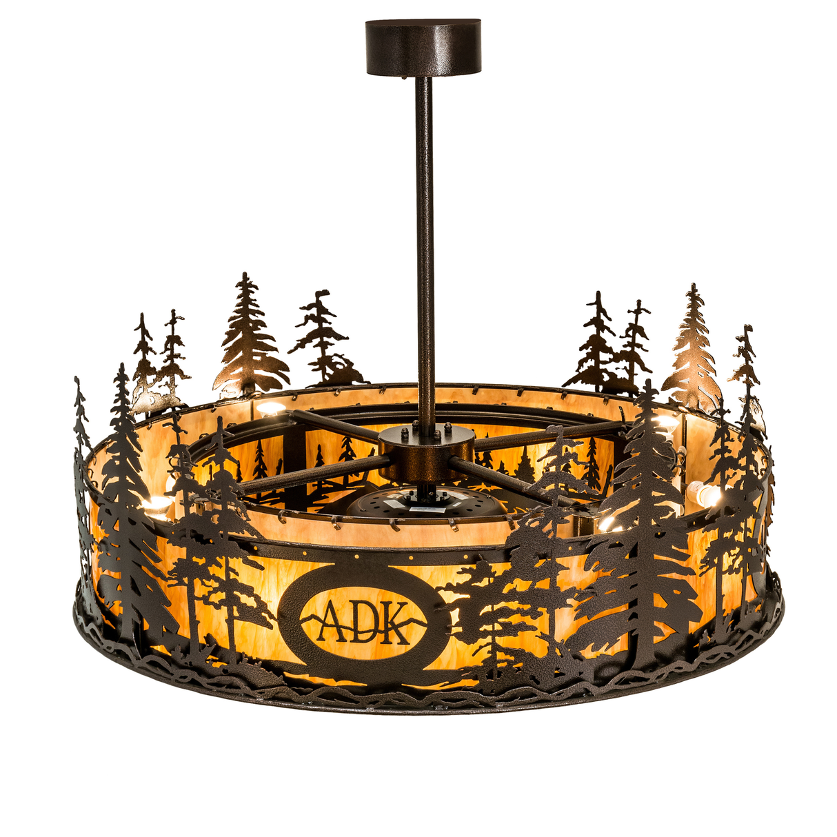 Top angle lit view displaying warm amber glow through pine cutouts.