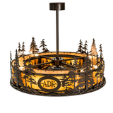 Top angle lit view displaying warm amber glow through pine cutouts.