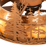 Close-up of pine tree metalwork and mica diffuser texture.