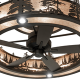 Closeup bottom view with illuminated pine forest design and fan assembly detail.