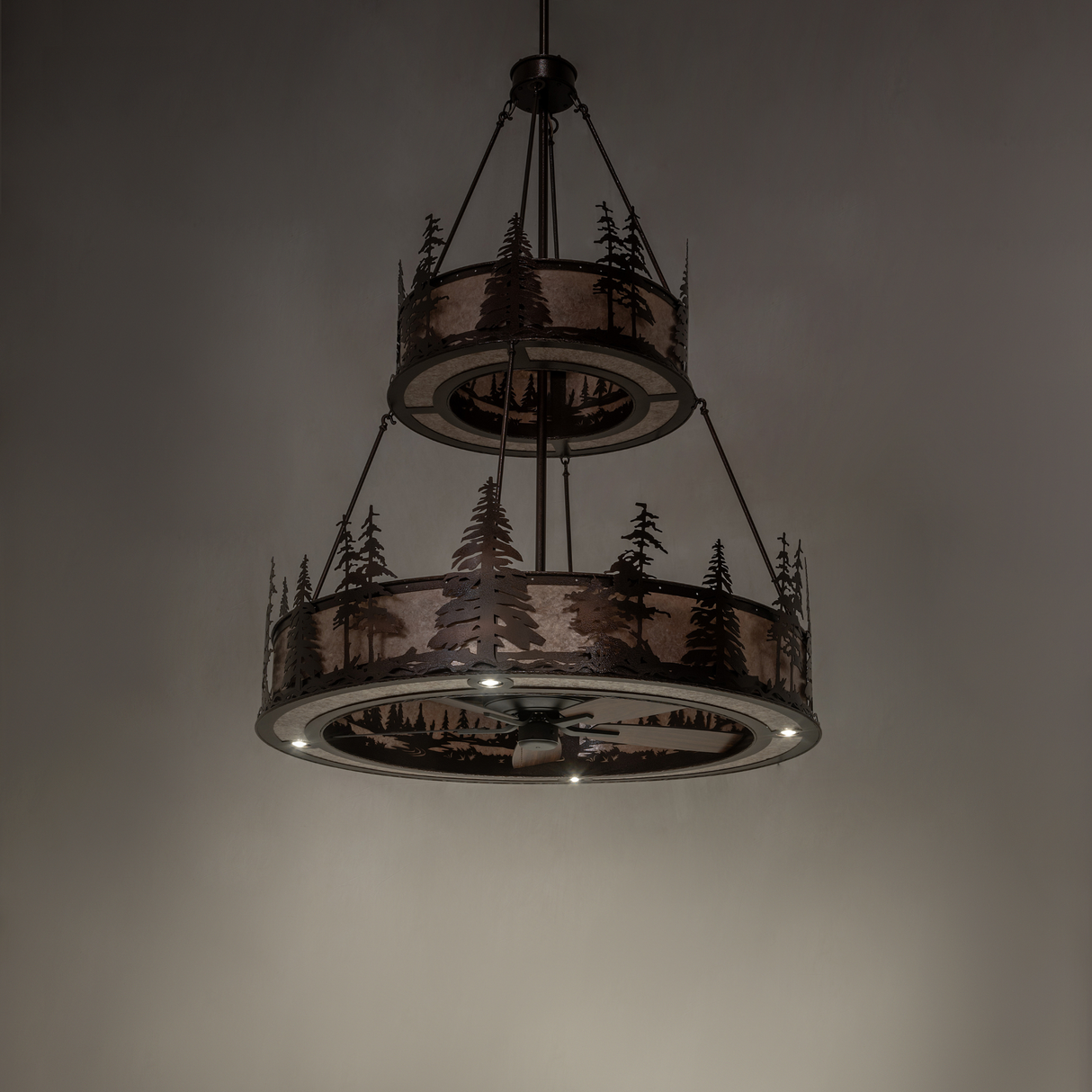 Dark ambient shot of Tall Pines two-tier chandelier fan.