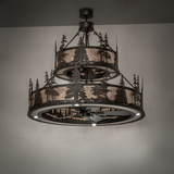 Dark room view showing four bulbs glowing in the circular frame with subtle forest reflections.