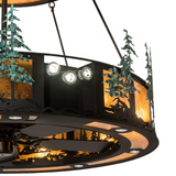 Close-up of lower tier showing LED spotlight cluster and forest silhouette.