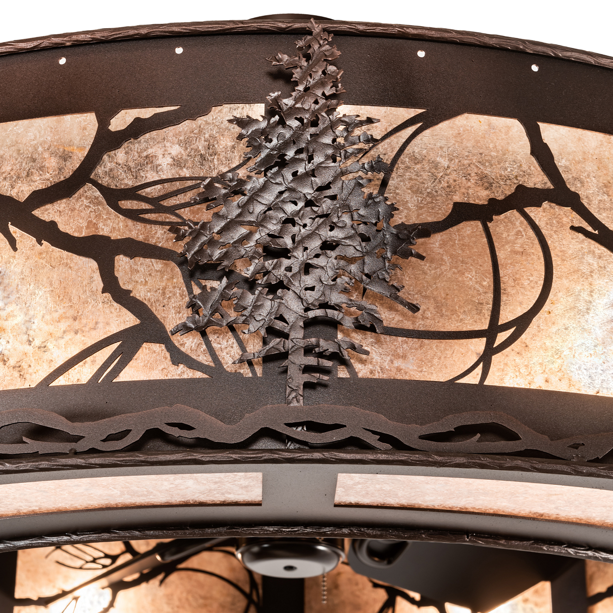 Close-up of detailed Tamarack tree design on mica shade.