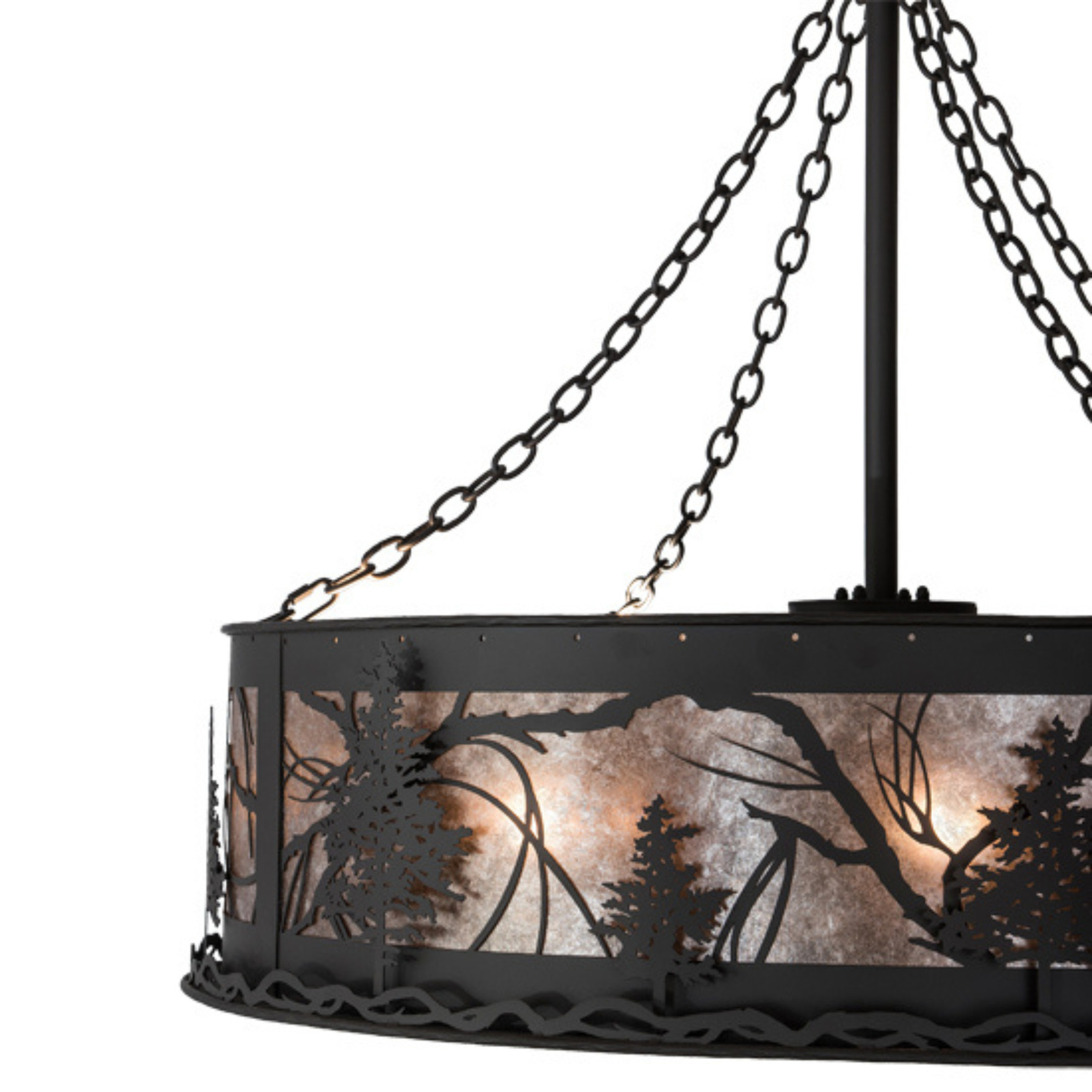 Close-up highlighting metal Tamarack tree cutouts and mica backdrop.