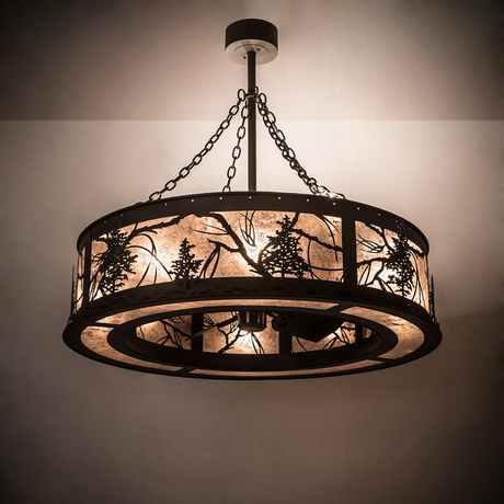 Warmly lit Tamarack Chandel-Air illuminating a rustic interior setting.