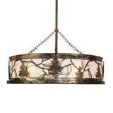 Side view of lit Tamarack Chandel-Air highlighting metal tree pattern.
