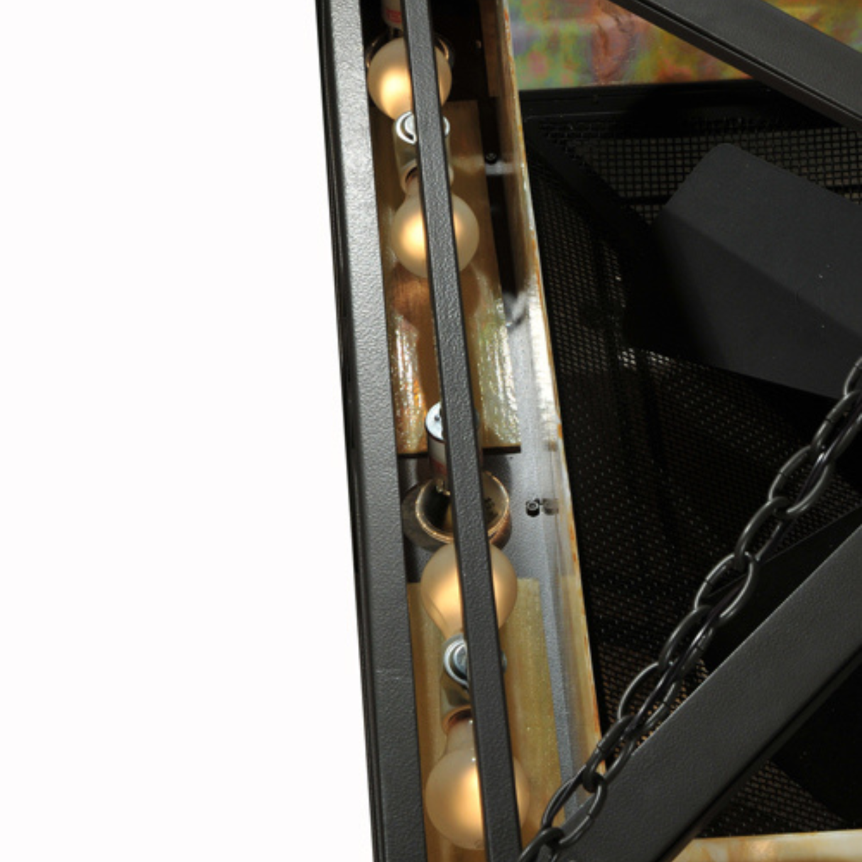 Close-up showing light bulbs and frame detailing.