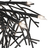 Detailed view of Thicket chandelier light arms with branch-inspired metal tubing.