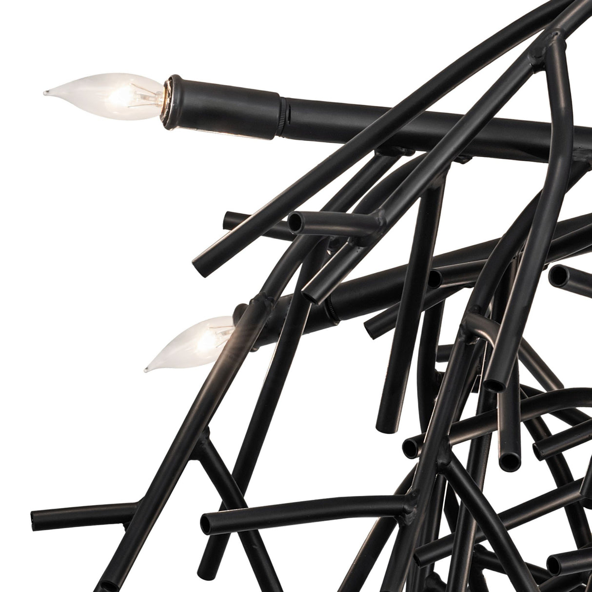 Close-up of Thicket chandelier branches showing black metal finish and exposed bulbs.