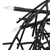 Close-up of Thicket chandelier branches showing black metal finish and exposed bulbs.