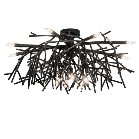 Lit view of Thicket chandelier showcasing branch-inspired black metal arms with glowing bulbs.