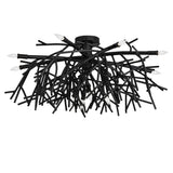 Unlit view of Thicket chandelier highlighting sculptural black metal branches and modern form.