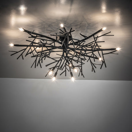 Thicket branch-inspired chandelier on ceiling, casting ambient light with sculptural metal branches.