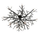 Bottom angle view of chandelier highlighting dense branch-inspired metal arms and bulb layout.