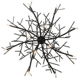 Underside view of chandelier revealing central hub and branching metal arm construction.