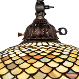 Close-up of Tiffany Fishscale stained glass shade pattern.