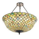 Closeup of the illuminated Tiffany Fishscale semi-flushmount.