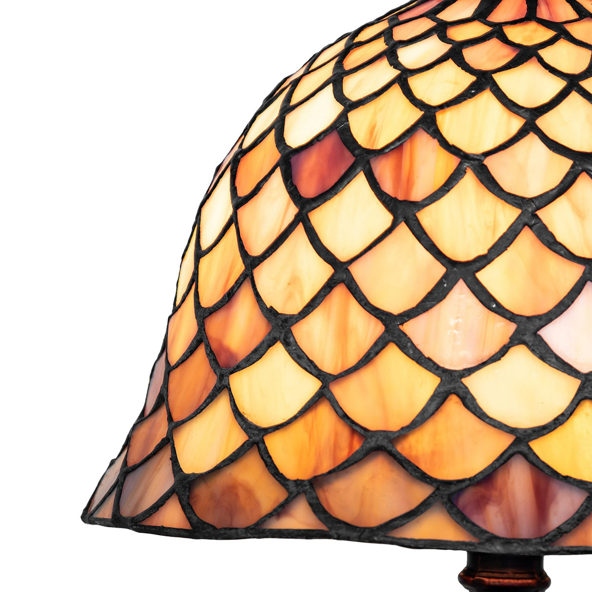 Close-up of the fishscale glass pattern in amber and burgundy on the Tiffany Mini Lamp.