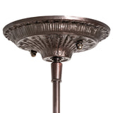 Decorative canopy with intricate patterns complementing the Tiffany Fishscale pendant.