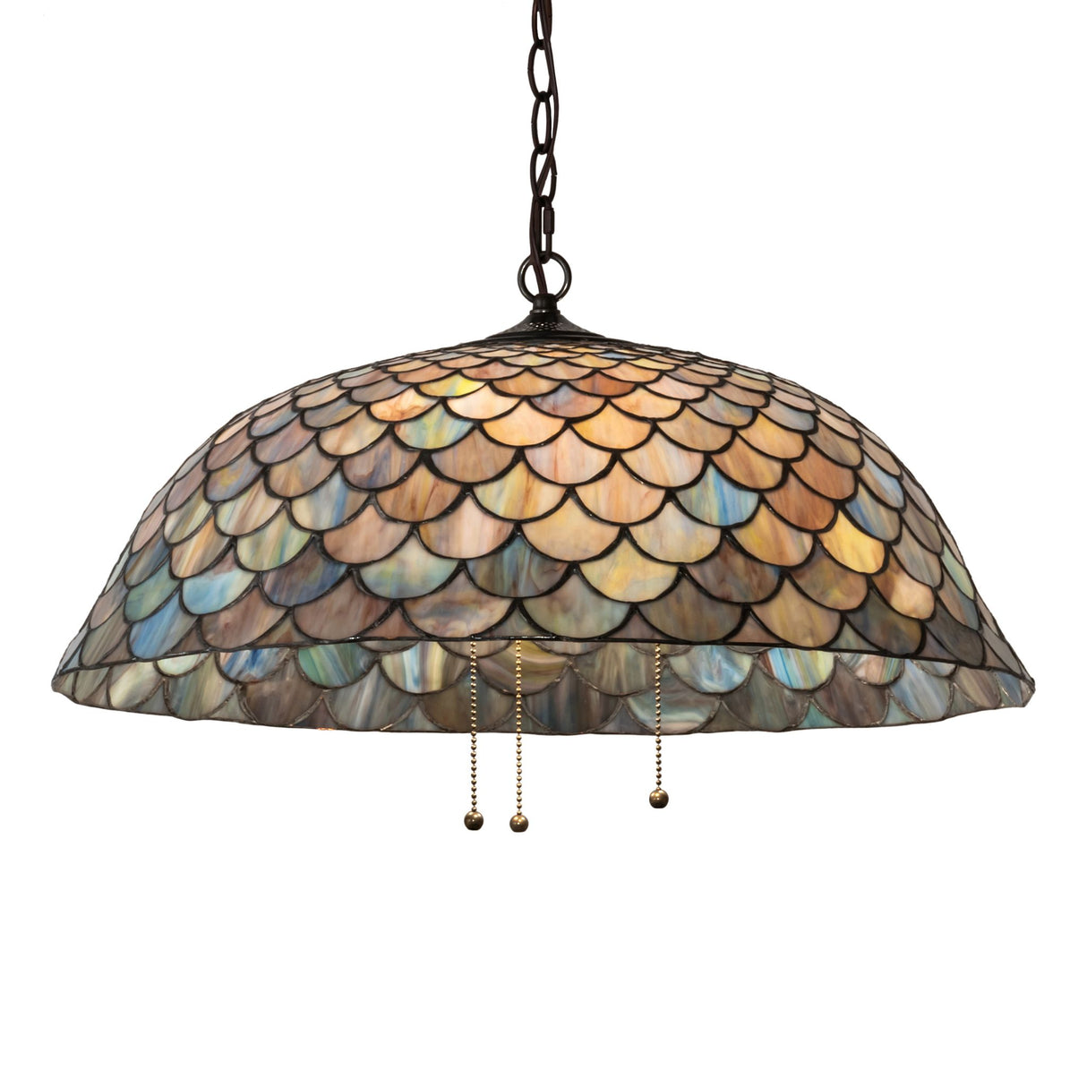 Illuminated Tiffany Fishscale pendant with vibrant honey-dripped emerald and amber hues.