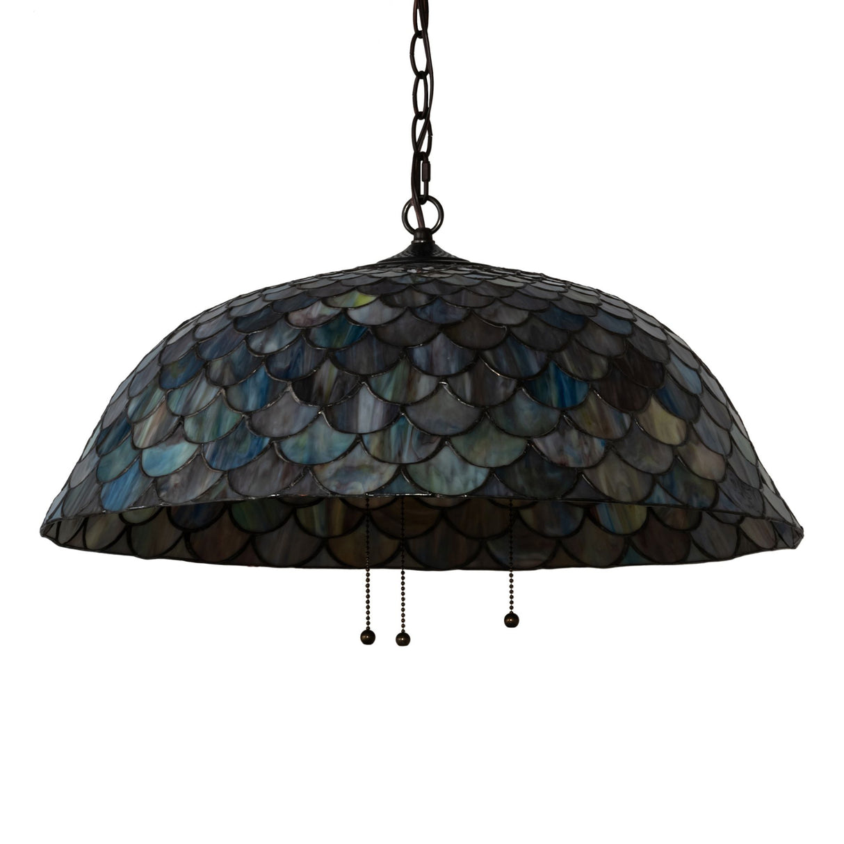Unlit Tiffany Fishscale pendant showcasing intricate emerald and mauve patterns.