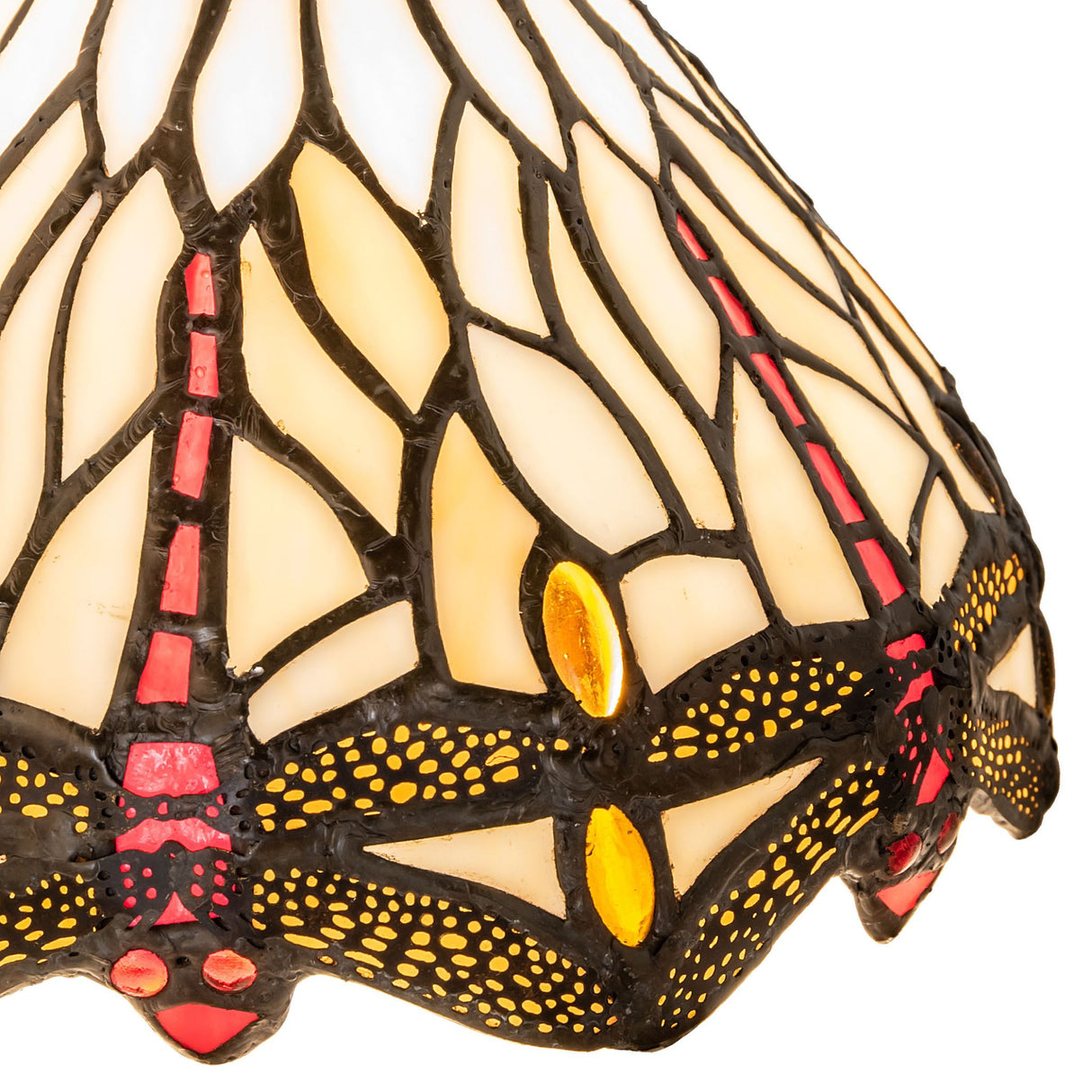 Detailed view of dragonfly wings and jewel embellishments.