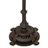 Close-up of ornate mahogany bronze lamp base detail.