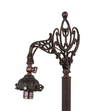 Detailed view of decorative bridge arm and socket without shade.