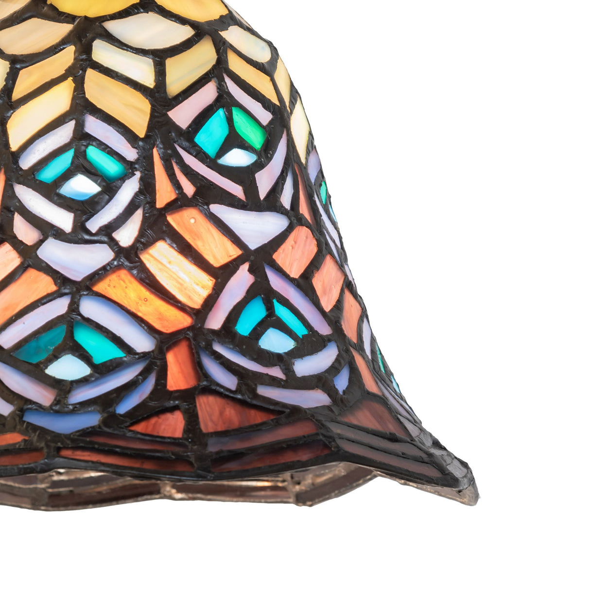 Detailed view of stained glass pattern on Tiffany Peacock Feather Mini Pendant.