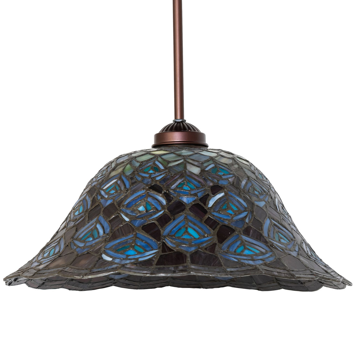 Tiffany Peacock Feather Pendant in a dimly lit setting, emphasizing intricate glass details.