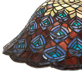 Close-up view of the stained glass on the Tiffany Peacock Feather Pendant with vibrant colors.