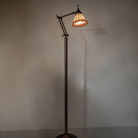 Tiffany Prairie Mission floor lamp glowing warmly in room setting.
