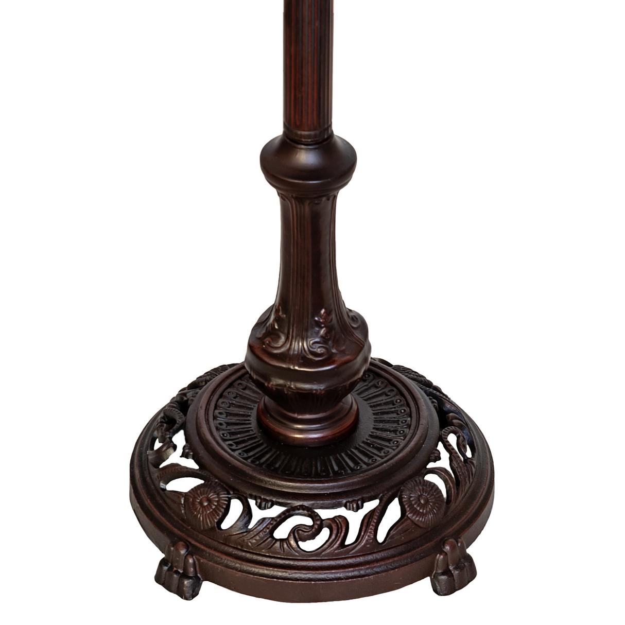 Detailed close-up of decorative metal base.