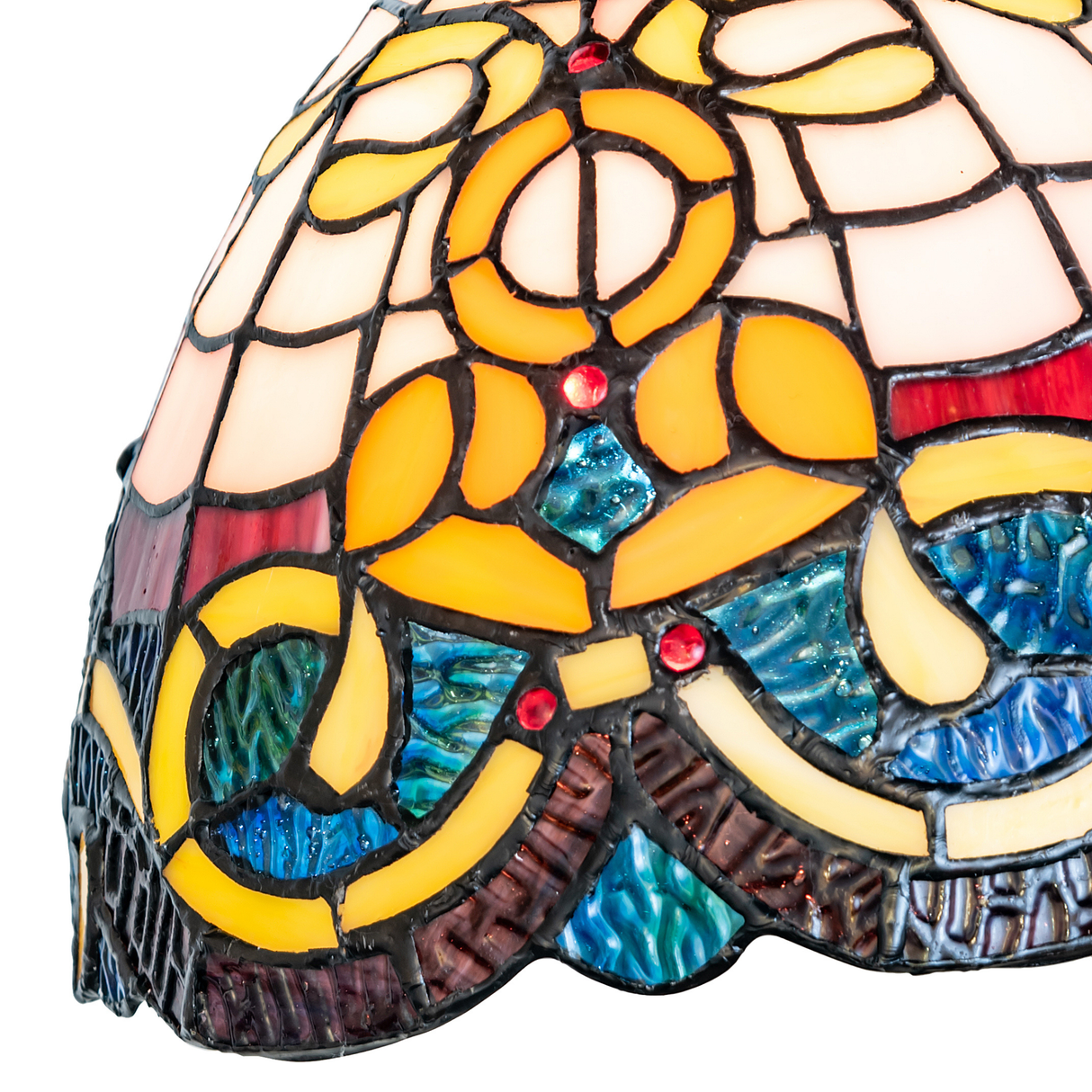 Close-up of multicolor Tiffany stained glass shade design.