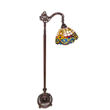 Side profile of Tiffany Saturday Morning bridge arm floor lamp.
