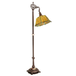 Lit Tiffany Shell & Diamond bridge arm floor lamp full view.