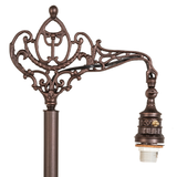 Detailed view of the decorative mahogany bronze bridge arm.