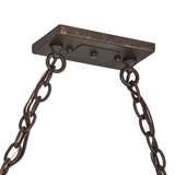 Ceiling plate and chain detail in rustic finish.