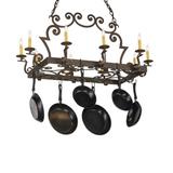 Side angle showing lit candlelights and downlights.