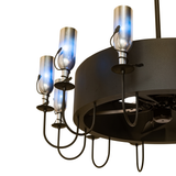 Close-up of chrome blue bottle lights and vine accents on Chandel-Air.