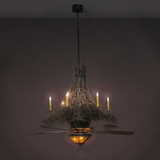 Twigs Fan Light Chandel-Air illuminated in a dark room setting.