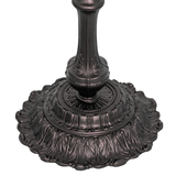 Close-up of decorative mahogany bronze lamp base.