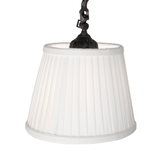 Close-up of pleated white Textrene lampshade texture.