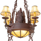 Closeup focusing on rustic pine tree metalwork and candle fixture design.