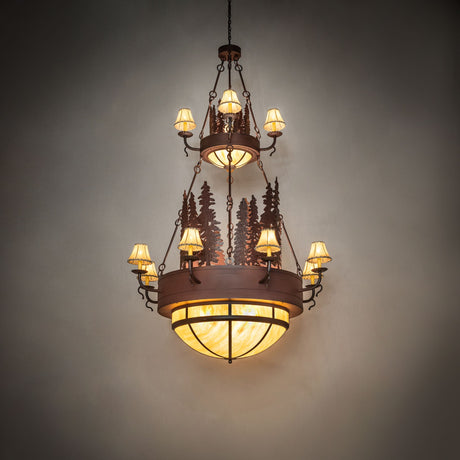 Walden Pine chandelier illuminated in a staged room setting highlighting warm glow.