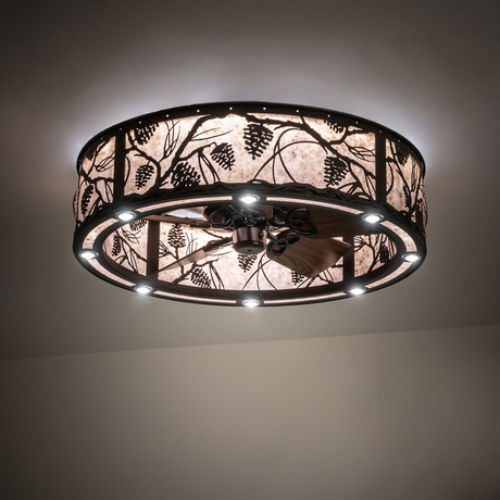 Whispering Pines chandelier fan softly lit against neutral ceiling.