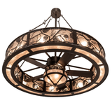 Bottom angle lit view showing fan blades framed by pine motif diffuser.